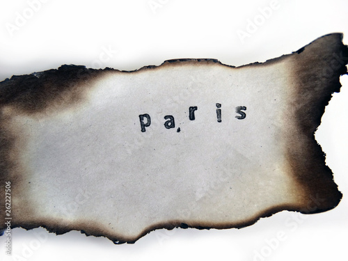 Paris Stamped on an old burned Paper, Fire april 2019 photo