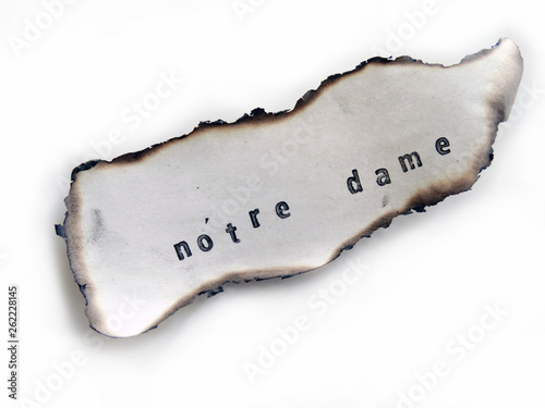 Notr Dame Stamped on an old burned Paper, Fire april 2019 photo