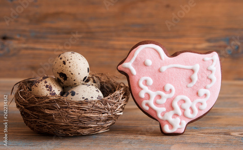 Colorful easter cookies on a wooden background