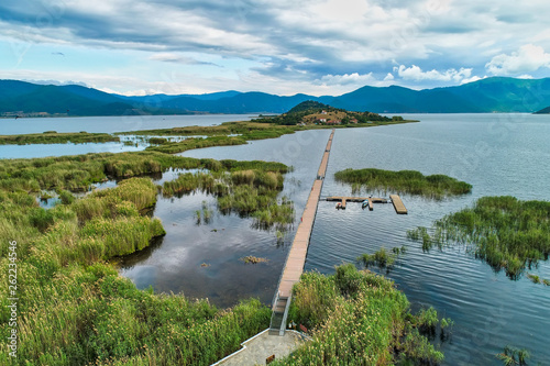aerial view of island of Agios Achilios in lake Small Prespes, Greece photo