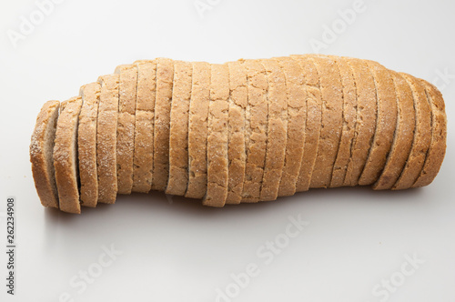 Top view of bread on white background.