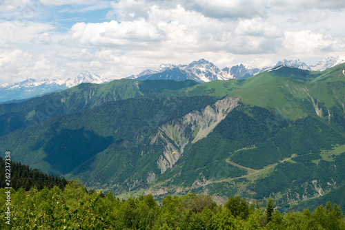 Mestia, Georgia - Jun 22 2018: Caucasus Mountain view from Peak of Zuruldi Mountain. a famous landscape in Mestia, Samegrelo-Zemo Svaneti, Georgia. photo