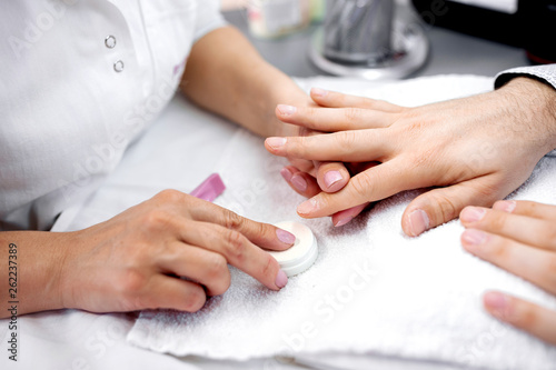 Nail care and manicure  man hands treatment