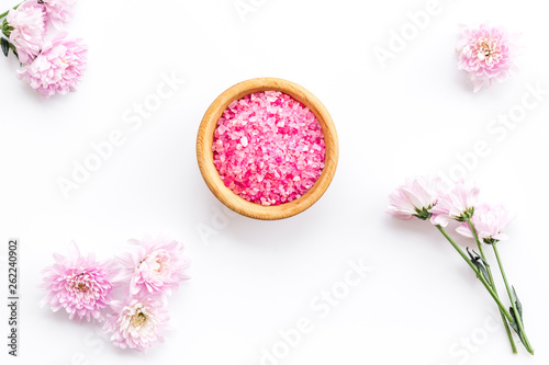 aroma therapy with pink flower fragrance and spa salt on white background top view © 279photo
