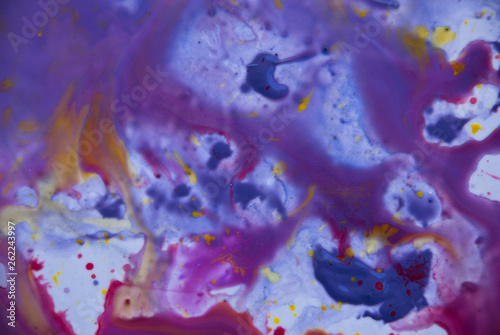 Fluid art psychedelic background. Purple pink yellow watercolor paint design.