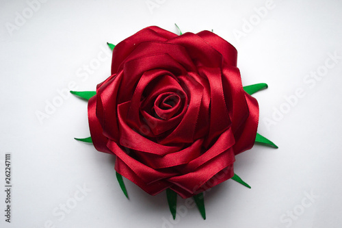 Handmade red rose isolated on white background