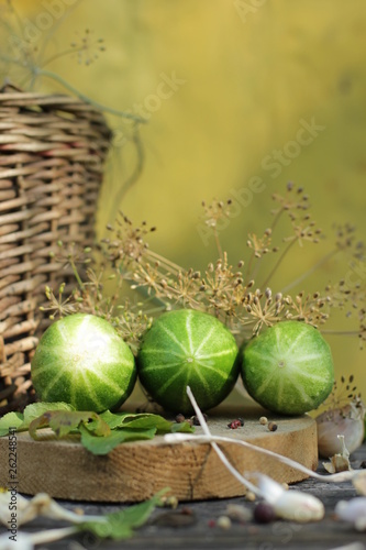 green cucumbers  basket and dill