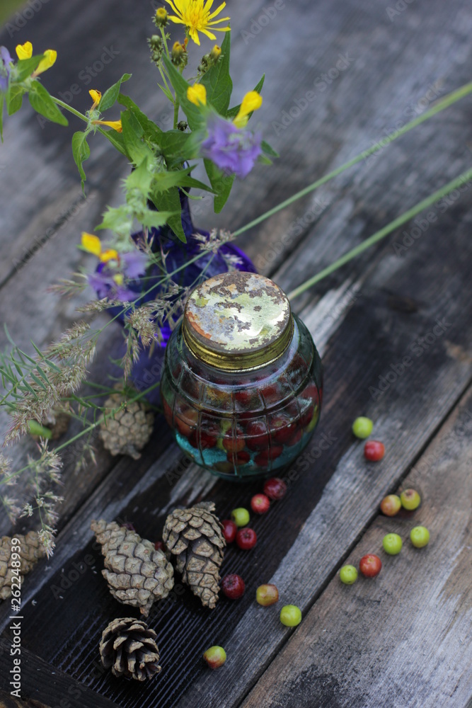 Fototapeta premium blue small bottle and blue white polka dot pitcher