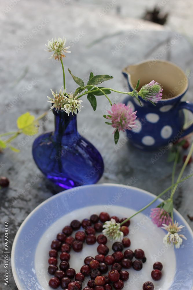 blue small bottle and blue white polka dot pitcher blue small bottle and blue white polka dot pitcher