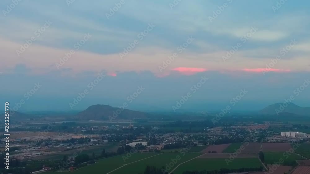 Scenic Calera de Tango rural Chilean commune agricultural fields at golden hour, drone shot Scenic Calera de Tango rural Chilean commune agricultural fields at golden hour, drone shot