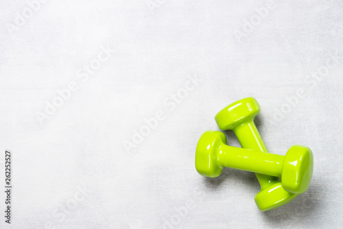 Dumbbells on white background top view.