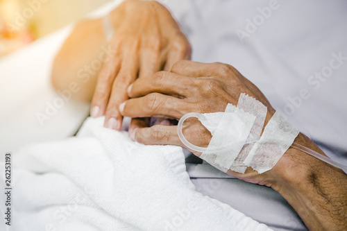 Close up hand of a patient in hospital ward