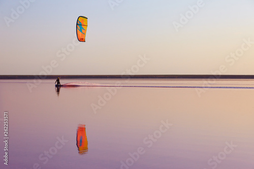Kitesurfing on pink lake
