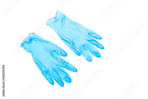 Two blue rubber gloves isolated on white surface © LIGHTFIELD STUDIOS