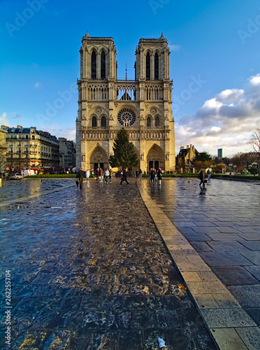 Wallpaper Mural Notre Dame de Paris cathedral, France. Winter blue sky with some clouds. Front view, great perspective. Torontodigital.ca