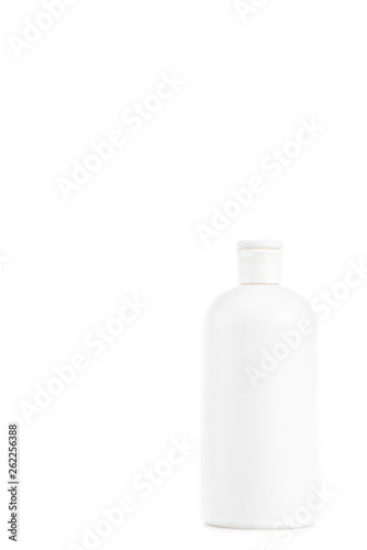 White cosmetic bottle with cap isolated on white