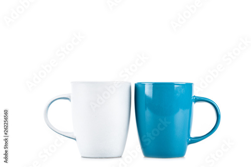 Ceramic white and blue cups isolated on white
