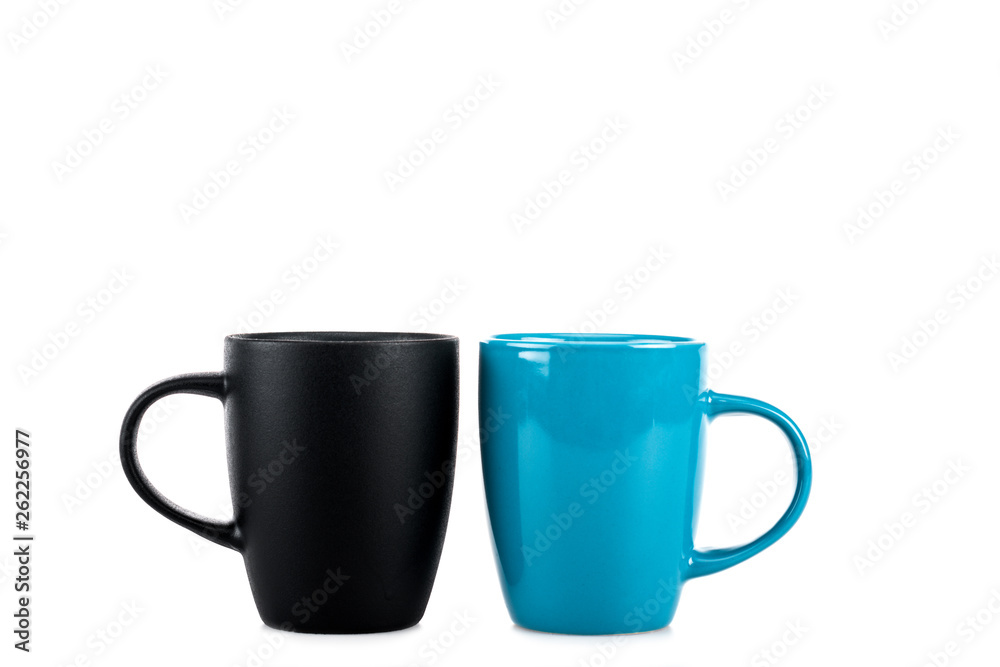 Big black and blue ceramic cups isolated on white