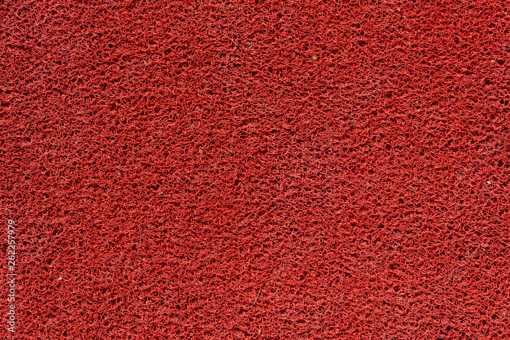 Detail red rubber mat floor background Photo | Adobe