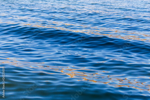 Waves on the surface of the pond as a background