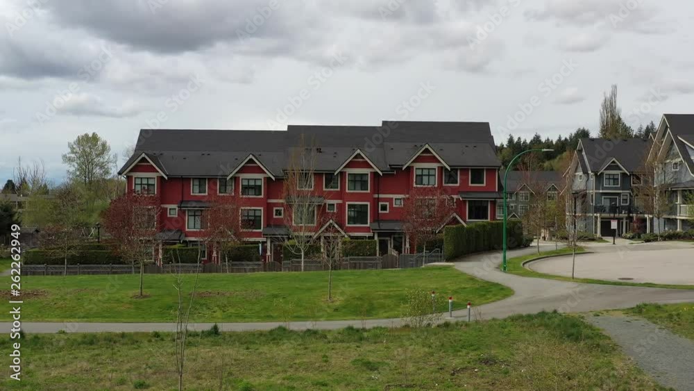 A perfect neighbourhood. Houses in suburb at Summer in the north America. Luxury houses with nice landscape. Aerial drone view. 4K. A perfect neighbourhood. Houses in suburb at Summer in the north America. Luxury houses with nice landscape. Aerial drone view. 4K.