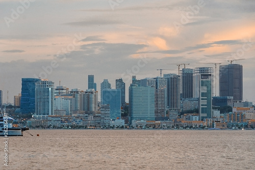 Luanda bay and seaside promenade at sunset, Marginal of Luanda, capital city of Angola- cityscape