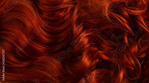 Tela Red hair background. Curly red hair.