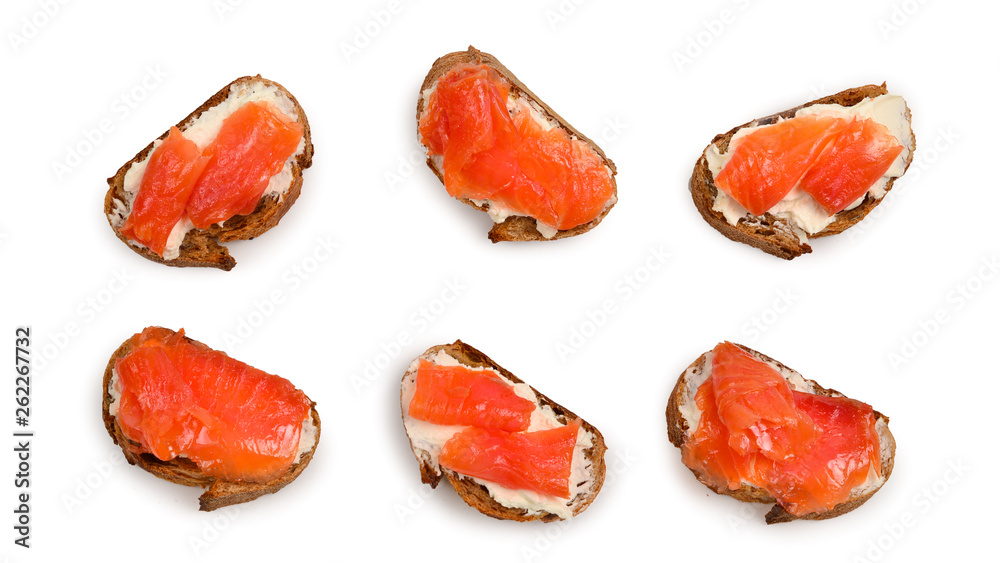 Salmon on a bread with cream isolated on white.