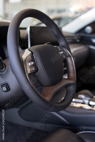 Interior of prestigious new car at dealer showroom. Modern transportation. . © tikhomirovsergey