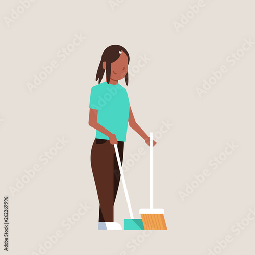 housewife sweeping floor with broom and scoop african american girl doing housework house cleaning concept female cartoon character full length flat gray background