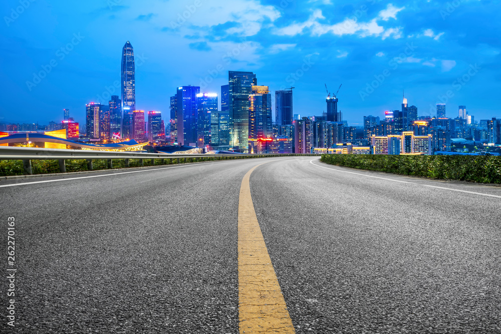 Road and skyline of urban architecture..