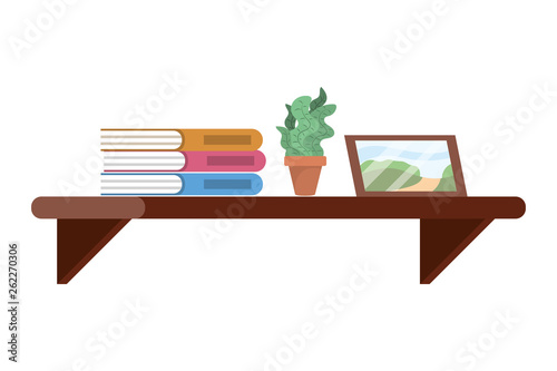 shelf with book plant and picture