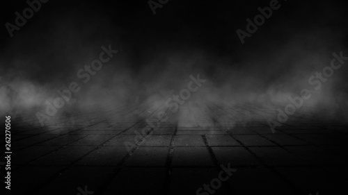 Dark street, night smog and smoke. Dark background of the night city, ray of light in the dark. Gloomy dark background.
