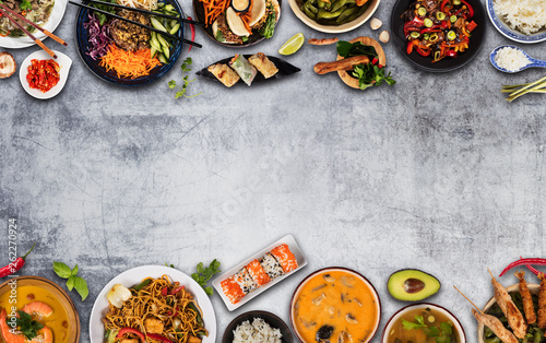 Top view composition of various Asian food in bowls