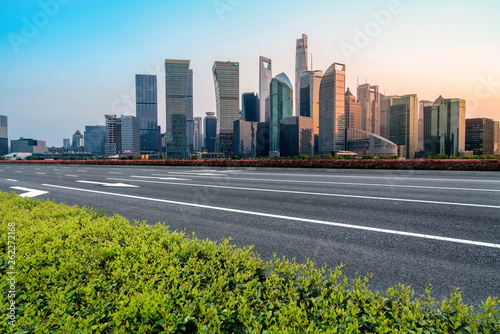 Canvas Print Empty Asphalt Road Through Modern City of Shanghai, China..