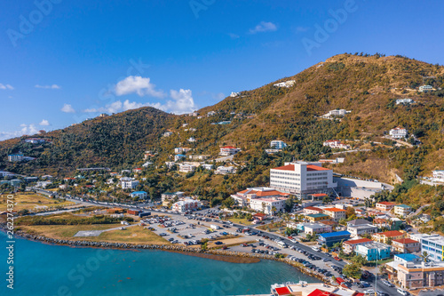 Scenic aerial view of capital of British Virgin Islands Tortola. Beautiful sunny summer landscape of little tropical islands in Caribbean sea. Look of port of small town on green hills. photo
