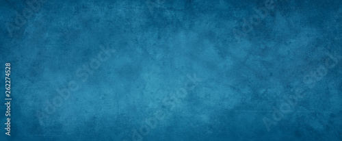Elegant blue background with marbled grunge texture with paint spatter and faint scratches