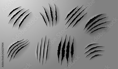 Set of Realistic scratch claws of animal. Hand drawn Animal's claws scratch scrape track. Hole in sheet of paper with torn edges. Vector illustration. Isolated on white background.