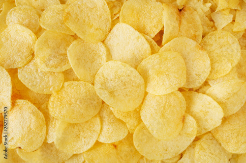 crispy potato chips snack texture background top view photo