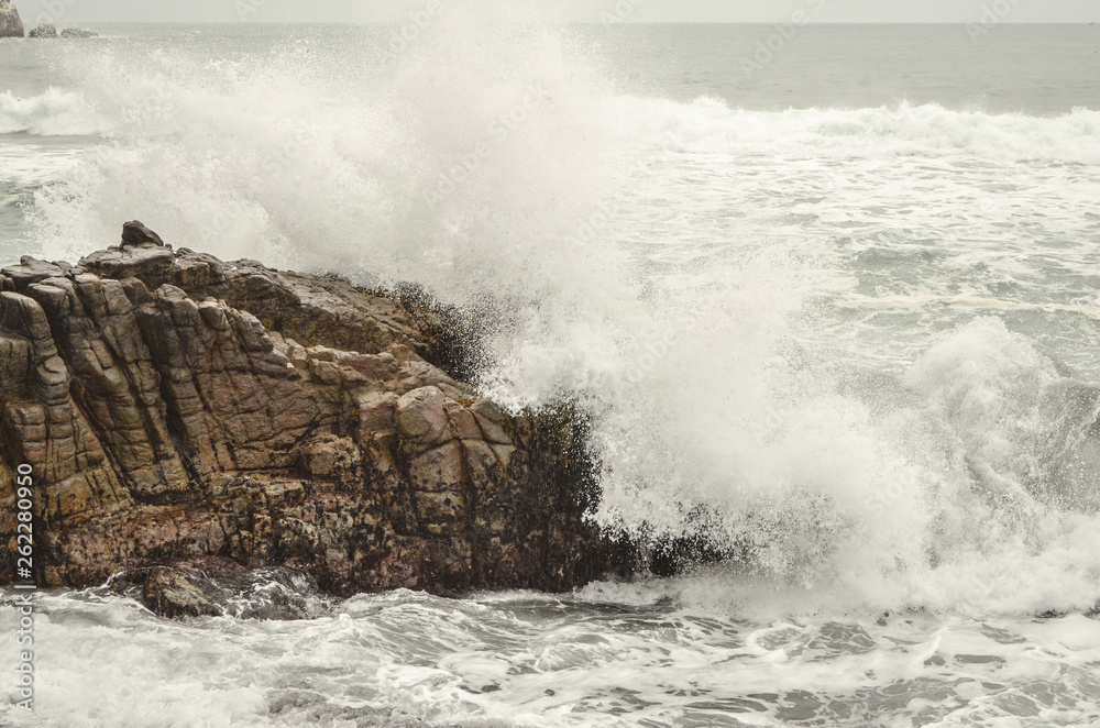 waves crashing on rocks waves crashing on rocks