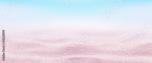 Marine pink sand background. Beach holiday summertime. Panoramic banner. photo