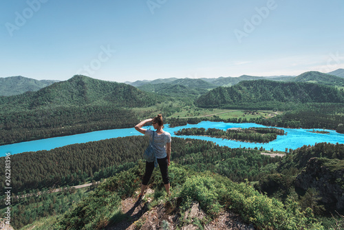 Woman taking photo in mountain