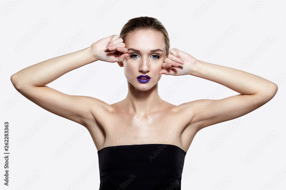 Beauty portrait of young woman with violet lips makeup Beauty portrait of young woman with violet lips makeup