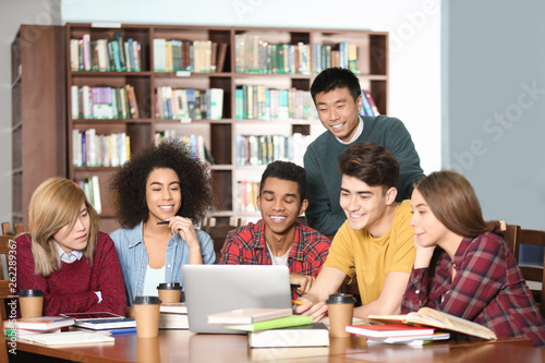 Group of students studying ...