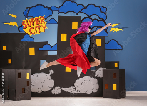 Cute girl as superhero agai...