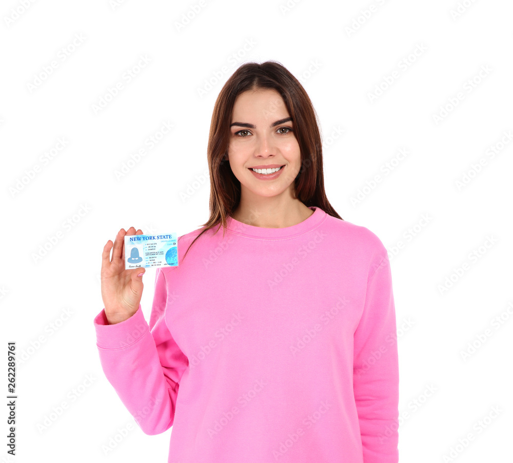 Happy young woman with driving license on white background Happy young woman with driving license on white background