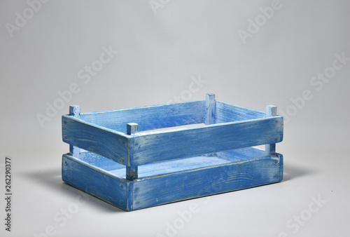 Handmade wooden crates in various colours