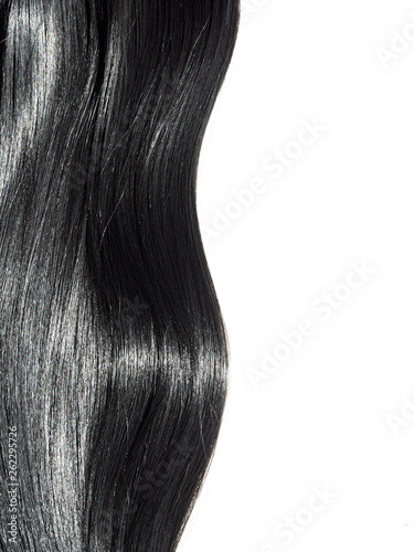 Shiny straight black hair background. Beautiful smooth brunette hair backdrop