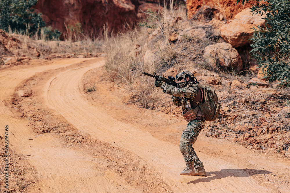 Soldiers of special forces on wars at the desert,Thailand people,Army soldier Walking patrol. Soldiers of special forces on wars at the desert,Thailand people,Army soldier Walking patrol.