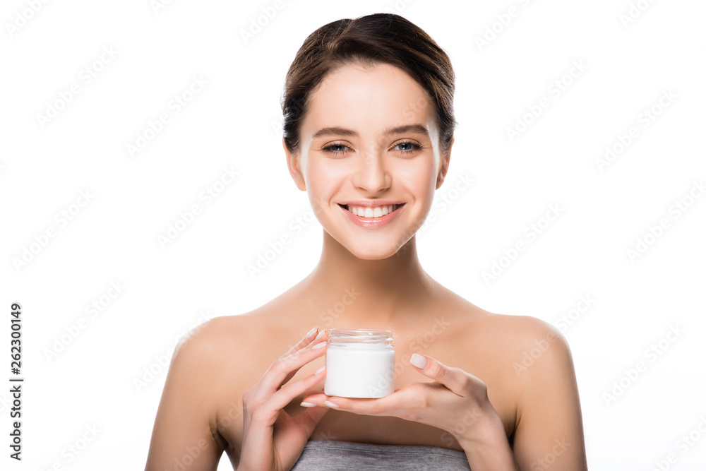cheerful girl holding container with cosmetic cream isolated on white cheerful girl holding container with cosmetic cream isolated on white
